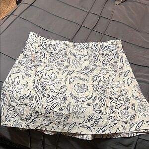 Ripskirt Hawaii Black, White, and Cream Floral Designed Mini Skirt